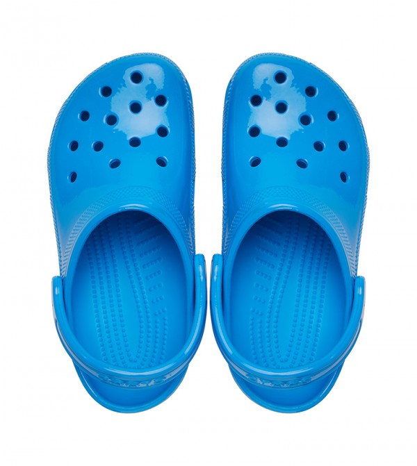 Neon blue crocs on sale